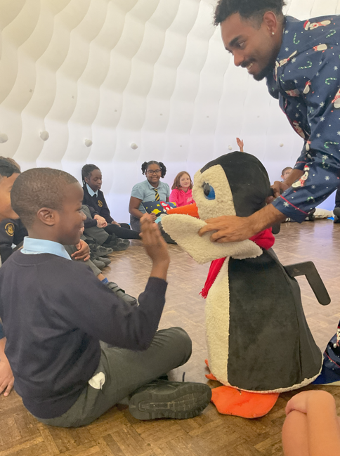 We spent time in a giant, inflatable igloo, learning about sign language.