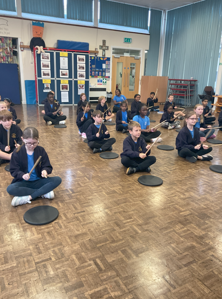 Showing our rhythm with a drumming workshop.